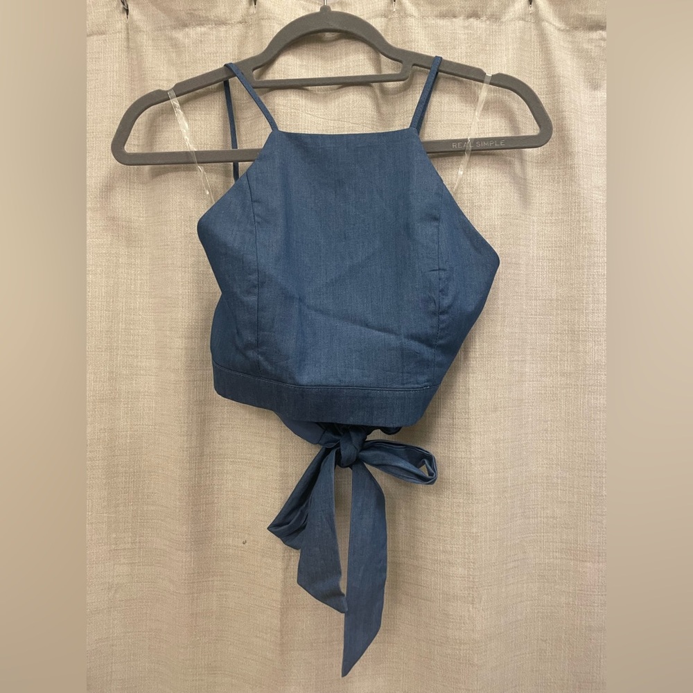 Denim blue Sage the Label crop top. Criss cross adjustable straps across back.